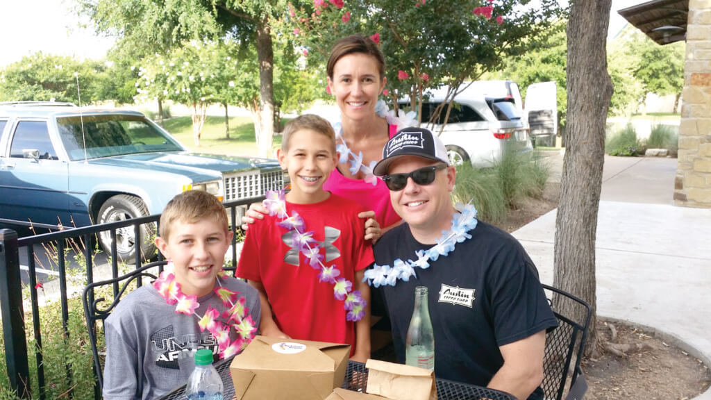 The Larrabee family of Steiner tried the apple fritters, orange glazed and lemon blueberry donuts at Big Kahuna Donut’s grand opening. “Who knew that a healthy donut could be so good?” said mom Bridget.