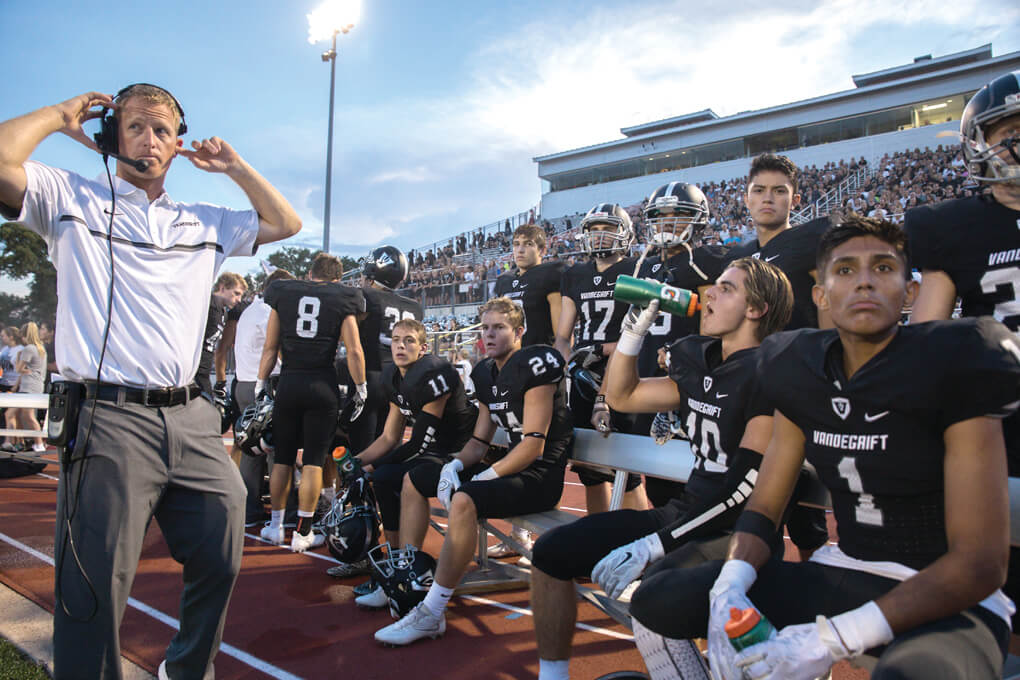 The Vandegrift Vipers offense watches the action on the field from the bench during a high school football game between the Vandegrift Vipers and the Permian Panthers at Monroe Stadium in Austin, Texas, on August 26, 2016