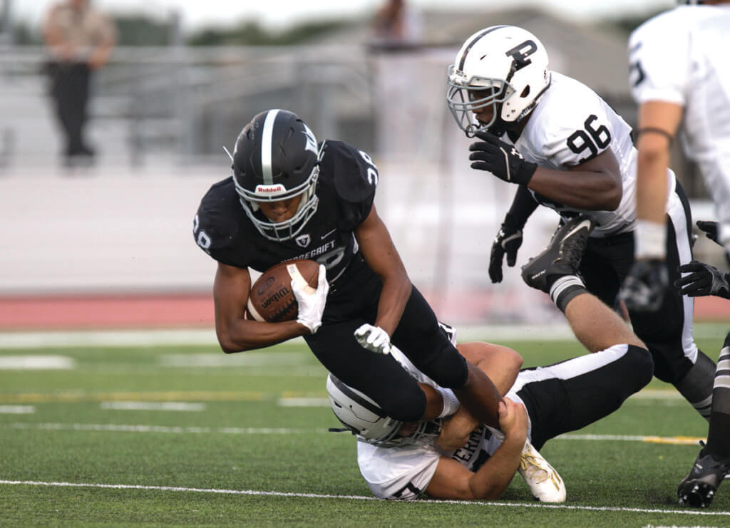 Vandegrift Vipers junior running back Mack Parker (28) runs the ball during a high school football game between the Vandegrift Vipers and the Permian Panthers at Monroe Stadium in Austin, Texas, on August 26, 2016