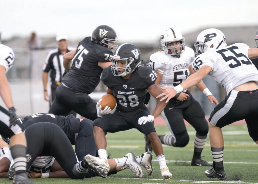 Vandegrift Vipers junior running back Mack Parker (28) runs the ball during a high school football game between the Vandegrift Vipers and the Permian Panthers at Monroe Stadium in Austin, Texas, on August 26, 2016