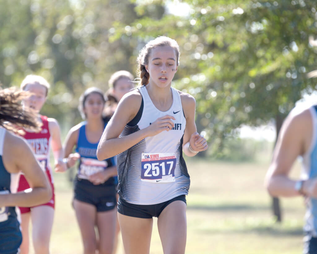 Loren Goddard of Vandegrift High School runs in the Girls Class 6A UIL Cross Country State Championships at Old Settlers Park in Round Rock, Texas, on November 12, 2016.