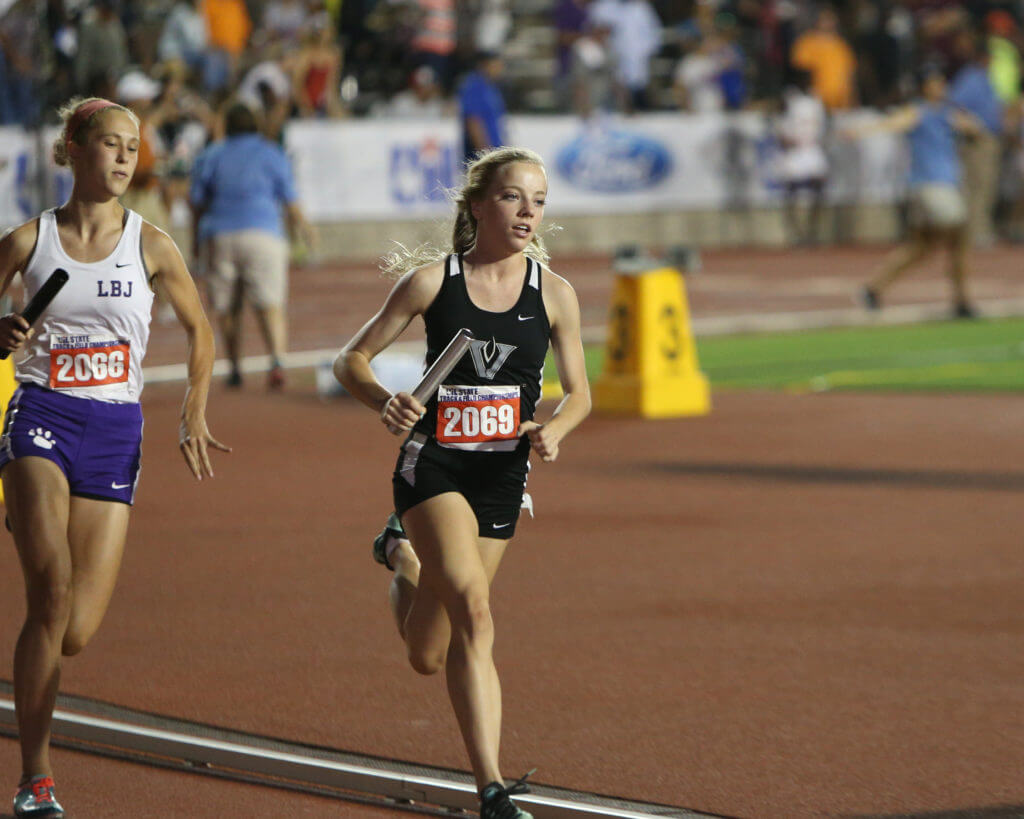 Adeline Carter of Vandegrift High School runs a leg of the Class 5A girls 1600-meter relay at the 2016 UIL State Track and Field Meet on Friday, May 13, 2016 at Mike A. Myers Stadium in Austin. Vandegrift's team finished seventh with a time of 3:56.85.