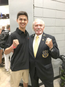 Antonio Cordova with taekwondo Grand Master William Clark at the American Taekwondo Association World Expo in Little Rock, Ark. in July. Cordova was awarded a scholarship in Clark’s name from the ATA.