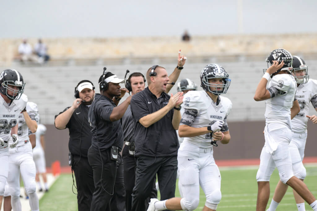 Vandegrift Vipers head coach Drew Sanders and the coaching staff celebrates after a touchdown during the Class 5A, Division I regional semifinal playoff game at Alamo Stadium in San Antonio on Friday, November 27, 2015.