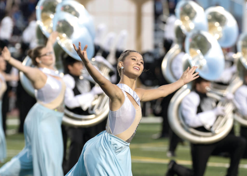 The Vandegrift High School band and Vision dance team performs before the start of a high school football game between the Vandegrift Vipers and the Leander Lions at Monroe Stadium in Austin, Texas, on October 7, 2016.