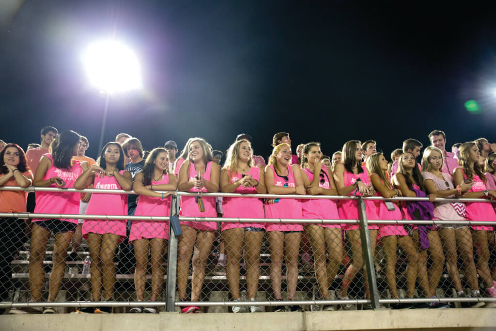 The Vandegrift student section was adorned with pink shirts during a 'Pink Out' night at a high school football game between the Vista Ridge Rangers and the Vandegrift Vipers at Gupton Stadium in Cedar Park, Texas, on October 14, 2016.