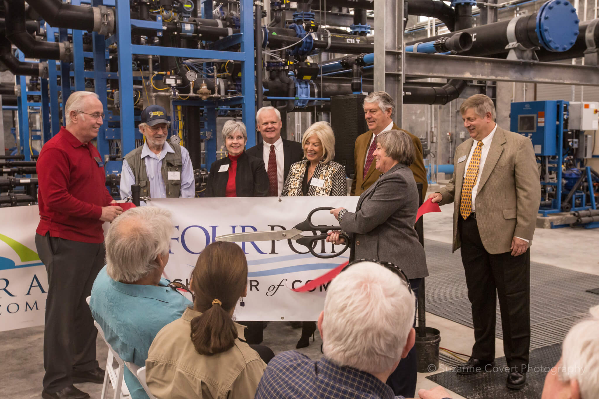 Travis County Water Control and Improvement District No. 17’s general manager, Deborah Gernes, cut the ribbon at the Four Points Chamber of Commerce ribbon cutting on Jan. 28. WCID directors were part of the event: Jeff Roberts, president, Mickey Decker, vice president, Jerri Lynn Ward, secretary, David Lewis Steed and Rob Carruthers. Photo by Suzanne Covert