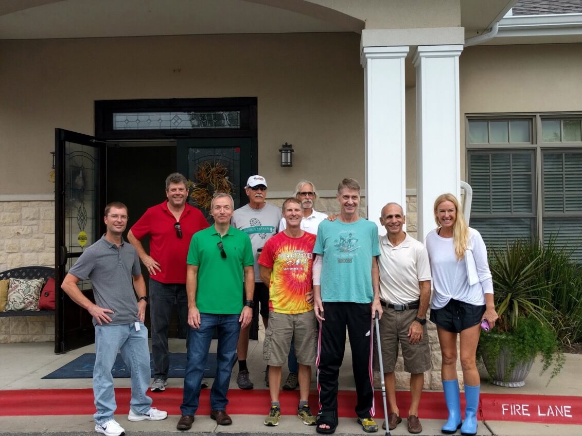 A group of Steiner Ranch cyclists and friends surprised John Holsinger the day he was discharged from the rehab center after surviving a 50-foot fall while cycling earlier this year.