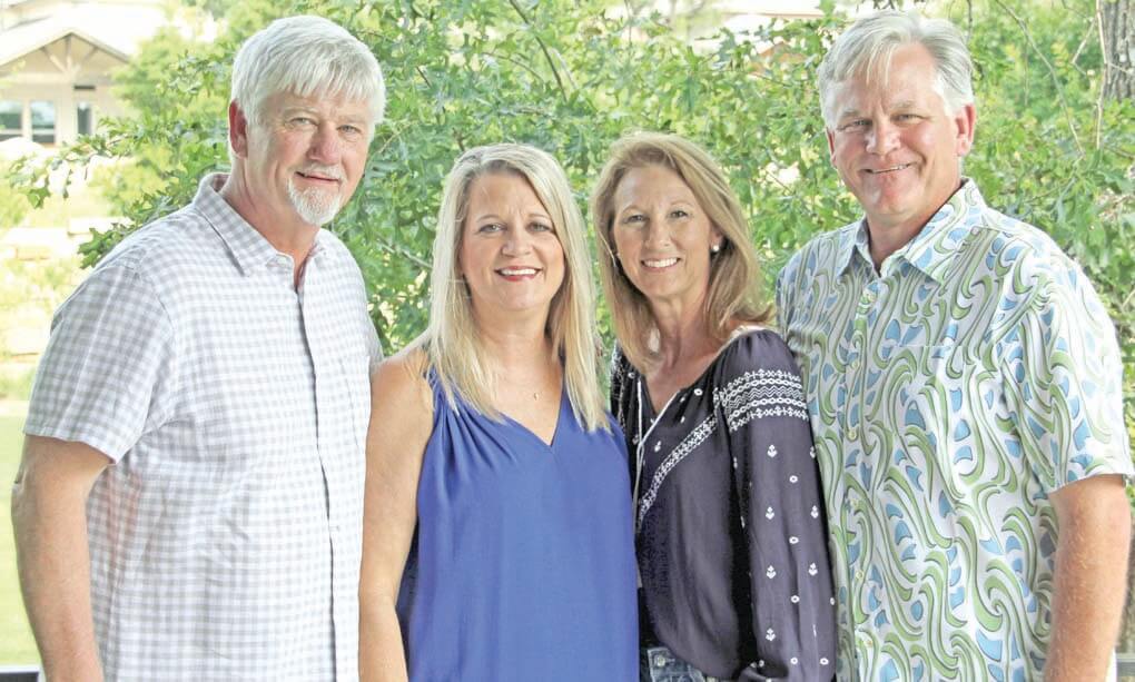 Local couples Kirby and Kathy Walker (left) and Ashley and Ross Goolsby (right) are teaming up to open Nik’s on the Lake later this month at the former Café Blue site in Volente.