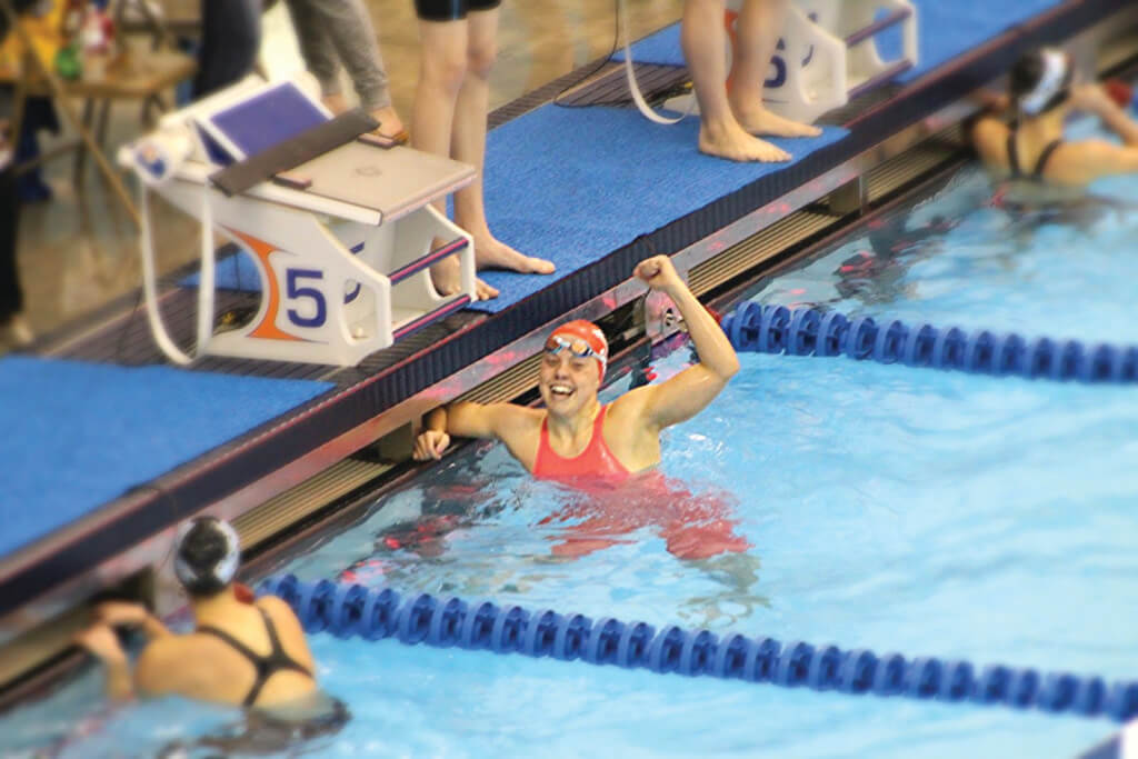 Steiner resident Kendall Shields, 15, celebrates beating the time needed to qualify to swim in the U.S. Olympic Swim Trials. 