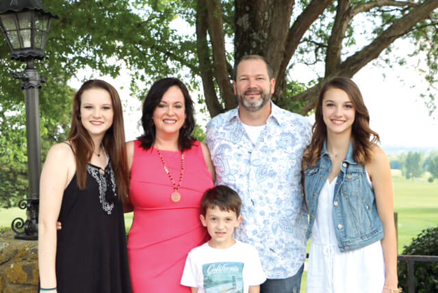 The Nuessner family of Four Points: (left to right) Madison, Jennifer, Scot, Lauren, and, in front, Ridge.