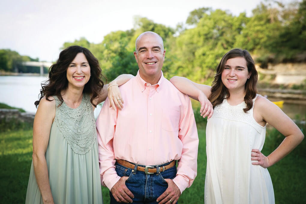 Certified financial planner and River Place resident, Bill Parrott, center, has written a book, “Up the Income Ladder: Generate More Income in Retirement”. It is available on Amazon.com. Pictured with Parrott are his wife, Tonya, and their daughter, 18-year-old Hannah.