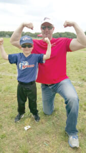 Courtney Phelps pictured with his son Bryson. 