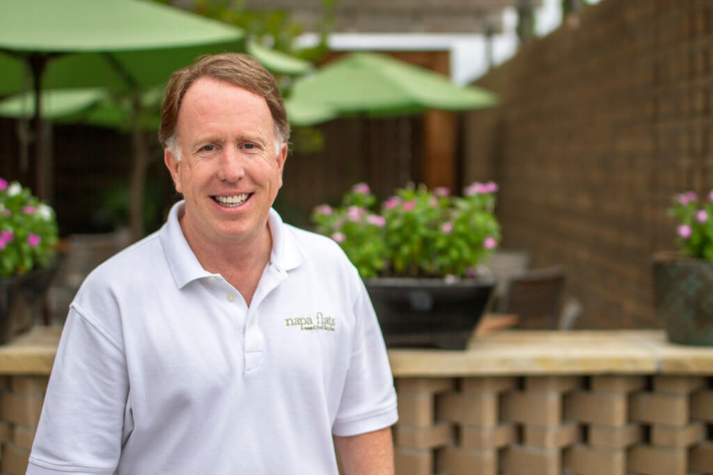 Tom Kenney of Austin is opening his fourth restaurant, Napa Flats Wood-Fired Kitchen, in The Trails at 620 this month.