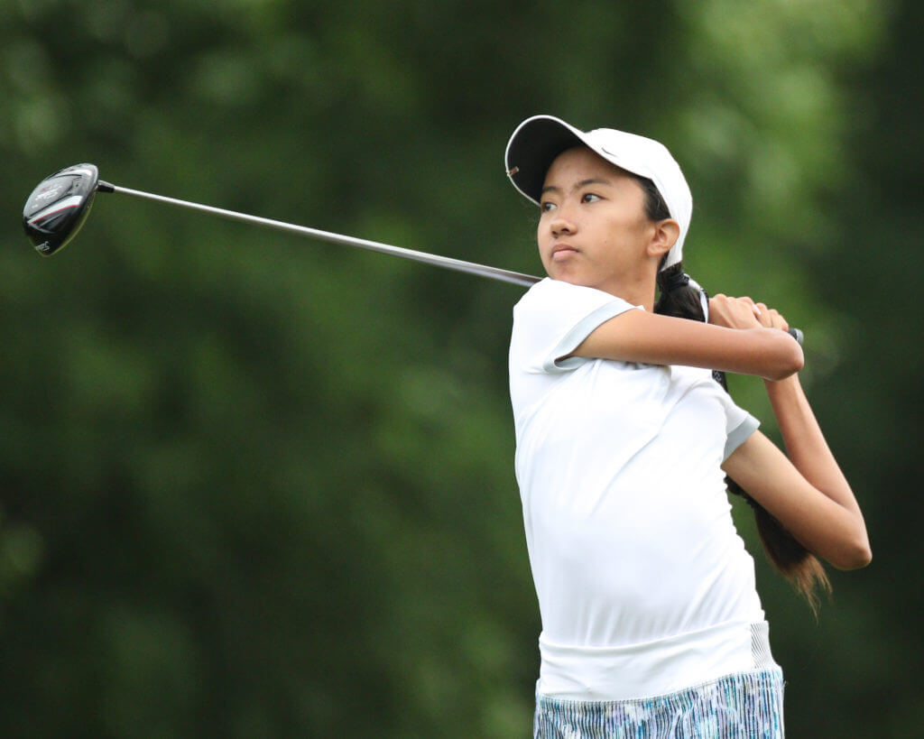 Halle Huang of Vandegrift High School watches a drive during the UIL Class 5A state golf tournament at Wolfdancer Golf Club in Cedar Creek. Photo by Scott W. Coleman