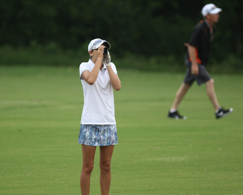 Vandegrift High School's Abbie Dunn surveys the distance to the green.