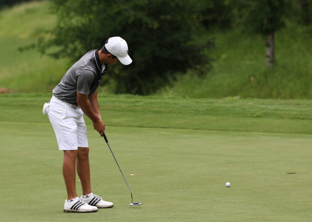 Daniel Martinez of Vandegrift High School putts at the UIL Class 5A state golf tournament at Wolfdancer Golf Club in Cedar Creek.