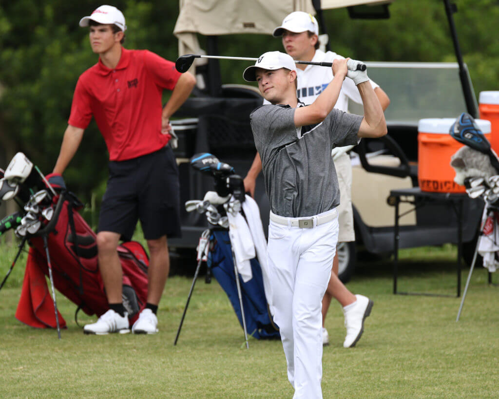 Cooper Dossey of Vandegrift High School struck the low round on Monday and has his team in the lead heading into the second round of the UIL Class 5A state golf tournament at Wolfdancer Golf Club in Cedar Creek.