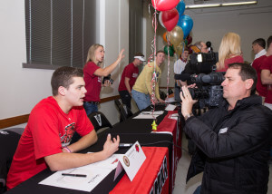 Vandegrift High School senior Garrison Spring talks with reporters on National Signing Day, Feb. 3, 2016. Spring signed a commitment to attend Lamar University.