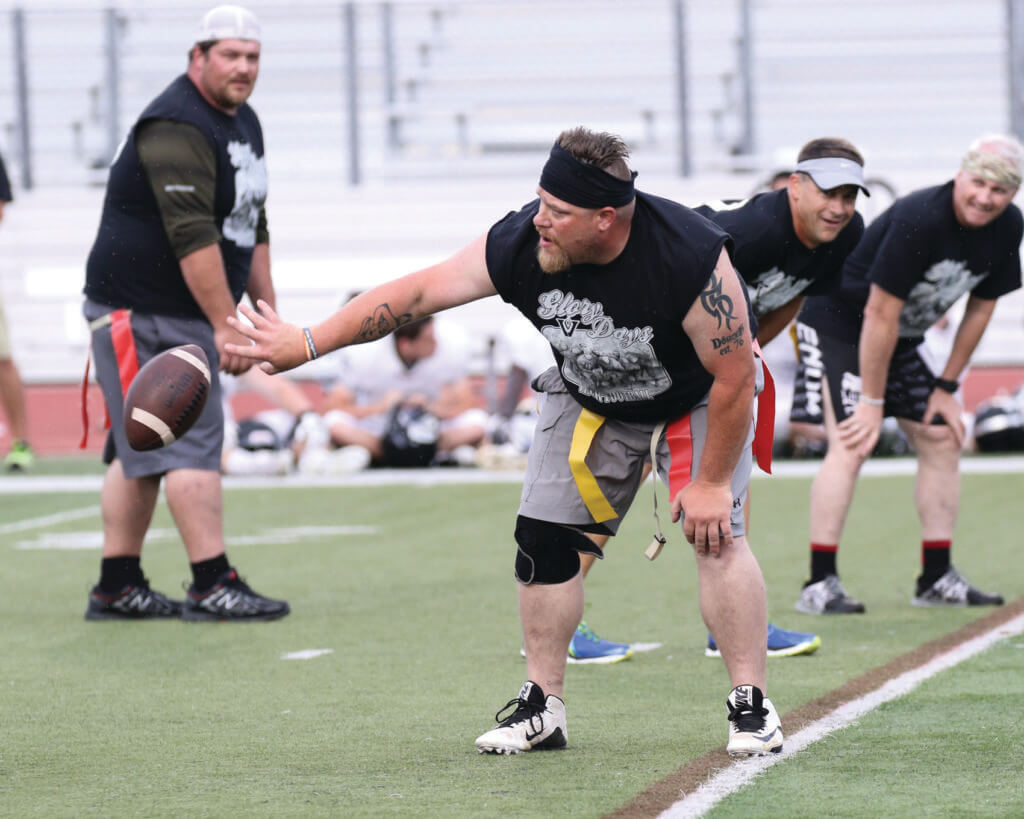 A group of Vandegrift parents participated in the school's annual Glory Days alumni game during halftime of the spring football game at Monroe Stadium on Thursday, May 26, 2016.