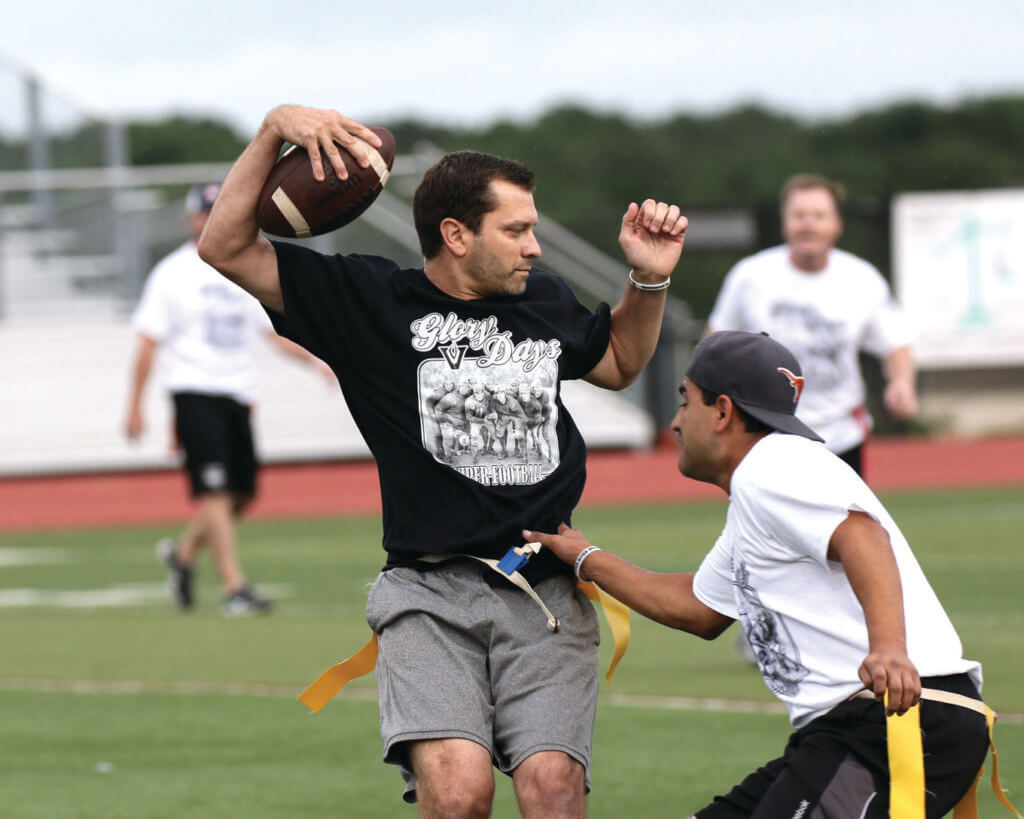 A group of Vandegrift parents participated in the school's annual Glory Days alumni game during halftime of the spring football game at Monroe Stadium on Thursday, May 26, 2016.