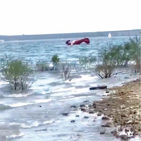 Jennifer Moran captured the event on video and posted it to Instagram reporting she was sailing when she heard the prop of the biplane die, “and suddenly they hit the water, flipped and began sinking.” 