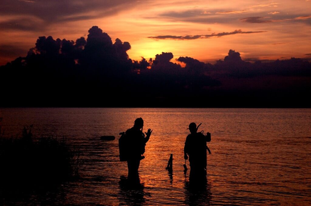 Sunset on Windy Point with divers. 